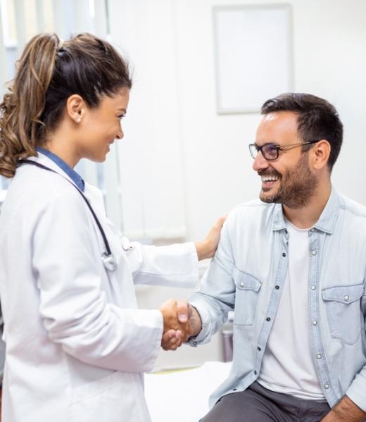 Smiling,Young,Female,Doctor,Shake,Hand,Close,Health,Insurance,Deal